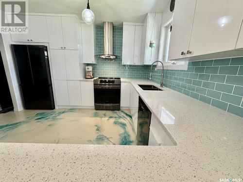 212 Taylor Avenue, Springside, SK - Indoor Photo Showing Kitchen With Double Sink