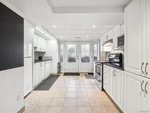 Cuisine - 1092 Rue Dion, Laval (Sainte-Dorothée), QC - Indoor Photo Showing Kitchen