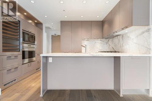 206 2118 W 15Th Avenue, Vancouver, BC - Indoor Photo Showing Kitchen With Upgraded Kitchen