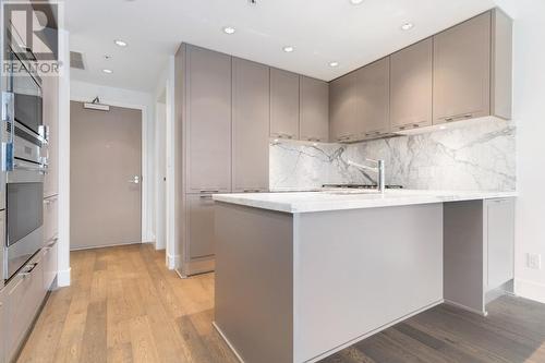 206 2118 W 15Th Avenue, Vancouver, BC - Indoor Photo Showing Kitchen With Upgraded Kitchen