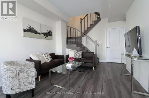 108 - 1565 Rose Way, Milton, ON - Indoor Photo Showing Living Room