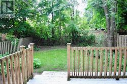 View of yard with a deck - 