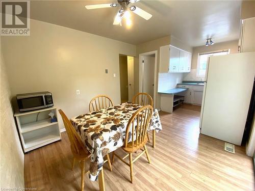 Dining space featuring ceiling fan and light hardwood / wood-style floors - 531 Brookhaven Crescent Unit# A, Waterloo, ON - Indoor Photo Showing Dining Room