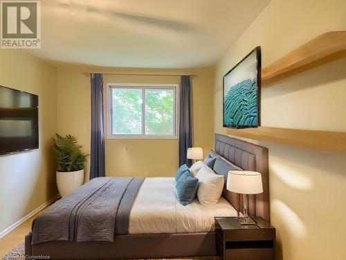 Bedroom with hardwood / wood-style flooring - 531 Brookhaven Crescent Unit# A, Waterloo, ON - Indoor Photo Showing Bedroom