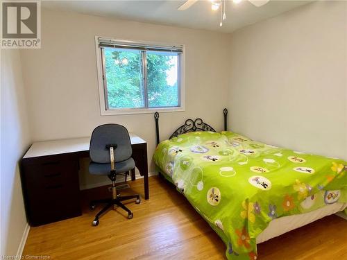 Bedroom with ceiling fan and light hardwood / wood-style floors - 531 Brookhaven Crescent Unit# A, Waterloo, ON - Indoor Photo Showing Bedroom