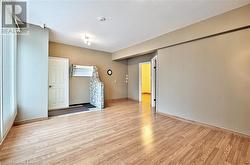 Unfurnished room featuring light hardwood / wood-style floors - 