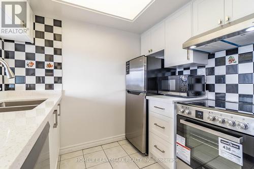 Ph17 - 2460 Eglinton Avenue E, Toronto, ON - Indoor Photo Showing Kitchen With Double Sink