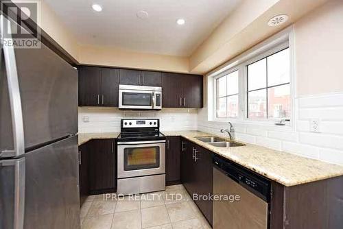 23 - 2480 Post Road, Oakville, ON - Indoor Photo Showing Kitchen With Double Sink