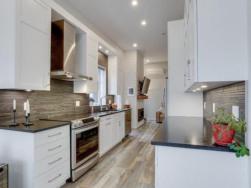 Cuisine - 32  - 32A Rue Labadie, Repentigny (Repentigny), QC - Indoor Photo Showing Kitchen With Upgraded Kitchen