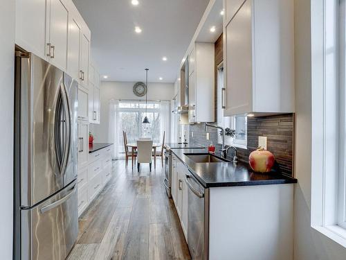 Cuisine - 32  - 32A Rue Labadie, Repentigny (Repentigny), QC - Indoor Photo Showing Kitchen With Upgraded Kitchen