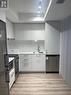 318 - 195 Commerce Street, Vaughan, ON  - Indoor Photo Showing Kitchen With Stainless Steel Kitchen With Double Sink 