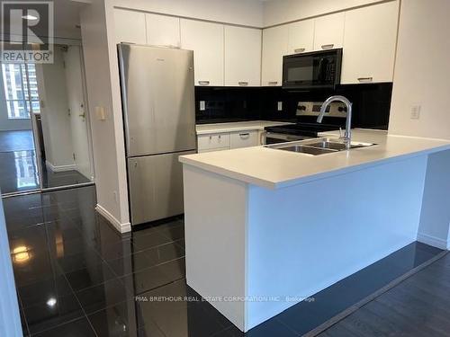 911 - 55 Harrison Garden Boulevard, Toronto, ON - Indoor Photo Showing Kitchen With Double Sink