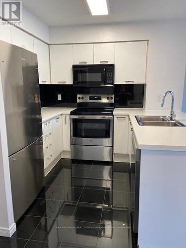 911 - 55 Harrison Garden Boulevard, Toronto, ON - Indoor Photo Showing Kitchen With Stainless Steel Kitchen With Double Sink