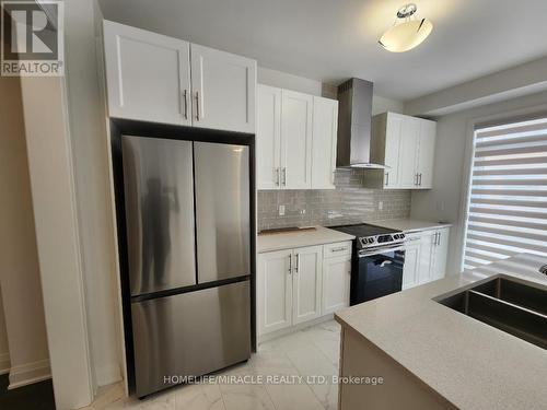 39 Dorian Drive, Whitby, ON - Indoor Photo Showing Kitchen With Stainless Steel Kitchen With Double Sink