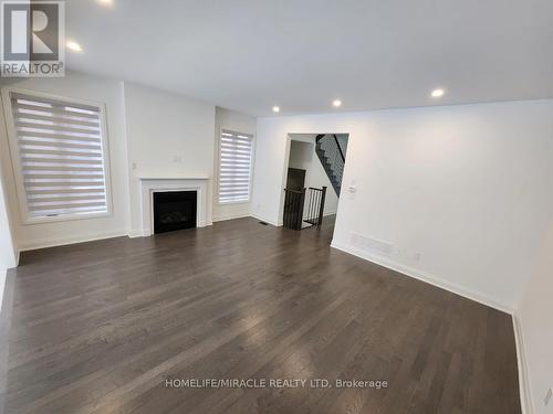 39 Dorian Drive, Whitby, ON - Indoor Photo Showing Living Room With Fireplace