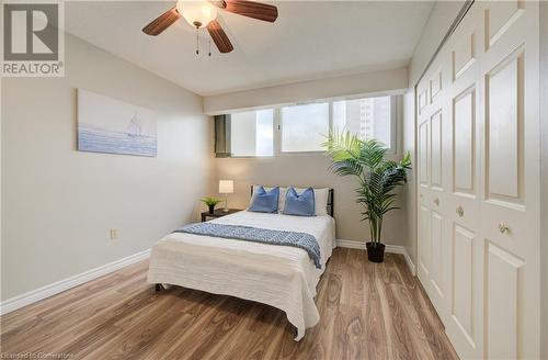 Bedroom1 - featuring ceiling fan, a closet, and light wood-type flooring - 375 King Street N Unit# 503, Waterloo, ON - Indoor Photo Showing Bedroom