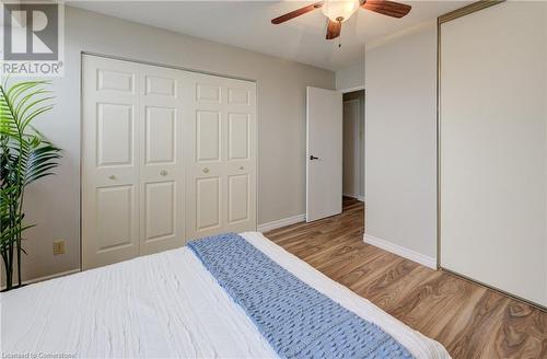 Bedroom1- featuring ceiling fan and light hardwood / wood-style floors - 375 King Street N Unit# 503, Waterloo, ON - Indoor Photo Showing Bedroom