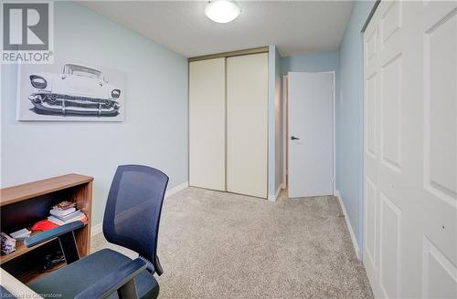 Bedroom2 - Carpeted, used as an office, featuring a textured ceiling - 375 King Street N Unit# 503, Waterloo, ON - Indoor