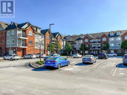 303 - 16 Westbury Road S, Wasaga Beach, ON - Outdoor With Balcony With Facade