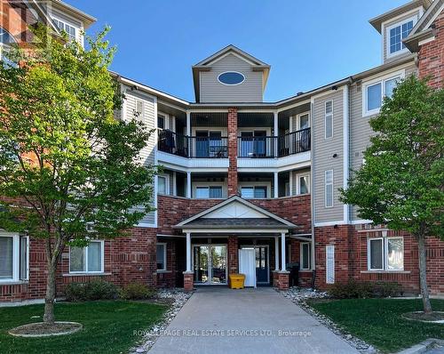 303 - 16 Westbury Road S, Wasaga Beach, ON - Outdoor With Balcony With Facade