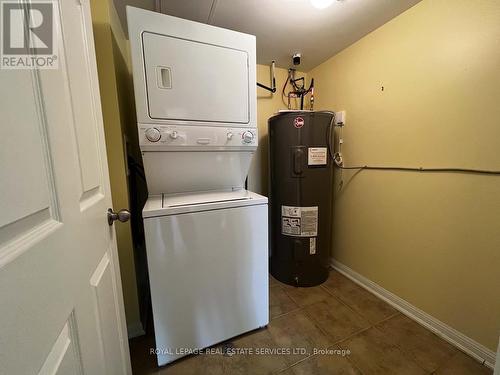 303 - 16 Westbury Road S, Wasaga Beach, ON - Indoor Photo Showing Laundry Room