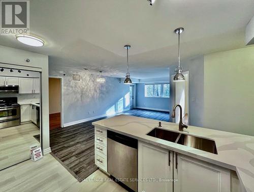 303 - 16 Westbury Road S, Wasaga Beach, ON - Indoor Photo Showing Kitchen With Double Sink