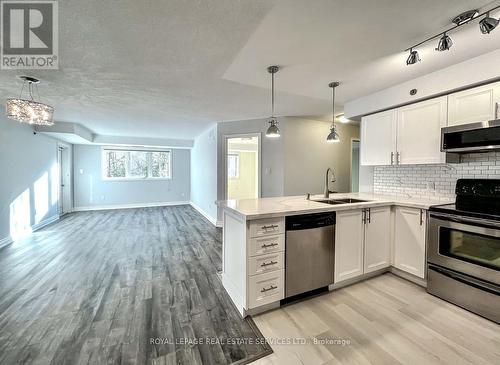 303 - 16 Westbury Road S, Wasaga Beach, ON - Indoor Photo Showing Kitchen With Double Sink With Upgraded Kitchen