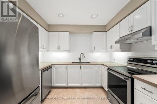 16 Warbrick Lane, Caledon, ON - Indoor Photo Showing Kitchen With Double Sink