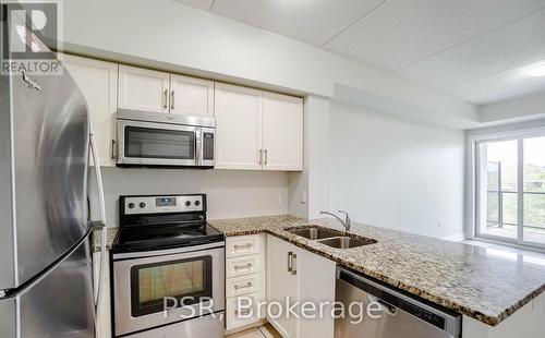 105 - 640 Sauve Street, Milton, ON - Indoor Photo Showing Kitchen With Stainless Steel Kitchen With Double Sink