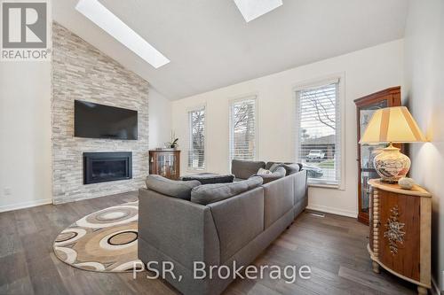 114 Chalet Crescent, London, ON - Indoor Photo Showing Living Room With Fireplace