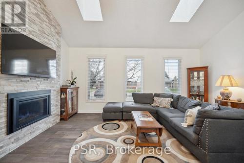 114 Chalet Crescent, London, ON - Indoor Photo Showing Living Room With Fireplace