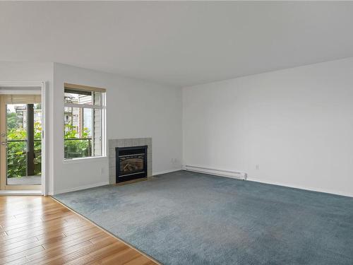 3207-27 Island Hwy South, Campbell River, BC - Indoor Photo Showing Living Room With Fireplace