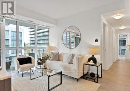 304 - 65 Annie Craig Drive, Toronto, ON - Indoor Photo Showing Living Room