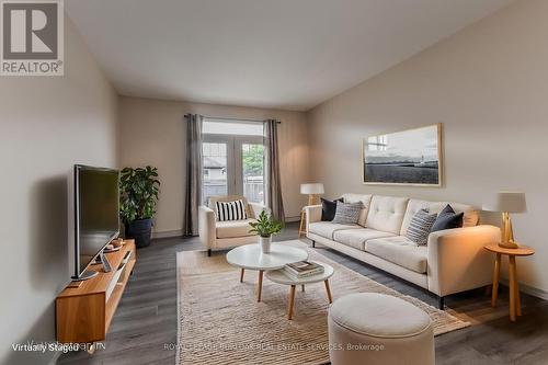 24 Manorwood Drive, West Lincoln, ON - Indoor Photo Showing Living Room