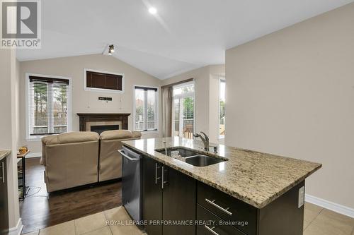 760 Fletcher Circle W, Ottawa, ON - Indoor Photo Showing Kitchen With Fireplace With Double Sink