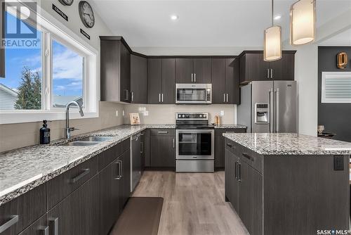 311 Delainey Manor, Saskatoon, SK - Indoor Photo Showing Kitchen With Double Sink With Upgraded Kitchen