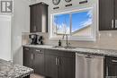 311 Delainey Manor, Saskatoon, SK  - Indoor Photo Showing Kitchen With Double Sink With Upgraded Kitchen 