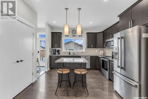 311 Delainey Manor, Saskatoon, SK - Indoor Photo Showing Kitchen With Upgraded Kitchen