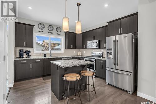 311 Delainey Manor, Saskatoon, SK - Indoor Photo Showing Kitchen With Upgraded Kitchen