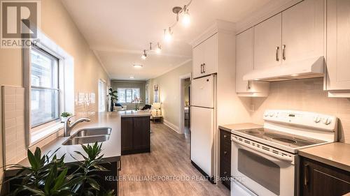 Main - 128 Lambton Avenue, Toronto, ON - Indoor Photo Showing Kitchen With Double Sink