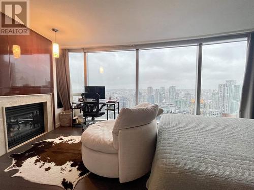 3305 938 Nelson Street, Vancouver, BC - Indoor Photo Showing Living Room With Fireplace