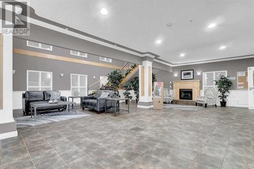 2460, 151 Country Village Road Ne, Calgary, AB - Indoor With Fireplace