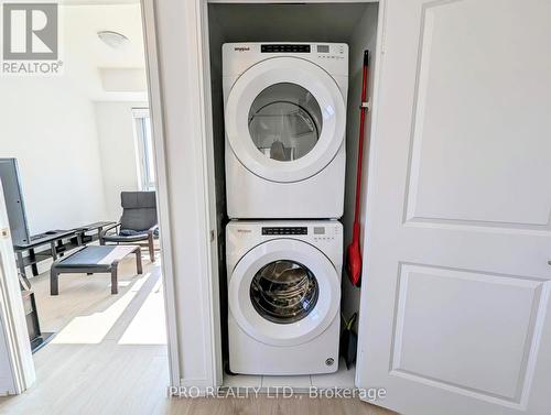 2721 - 8 Nahani Way, Mississauga, ON - Indoor Photo Showing Laundry Room