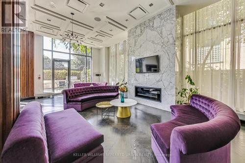 426 - 775 King Street W, Toronto, ON - Indoor Photo Showing Living Room With Fireplace