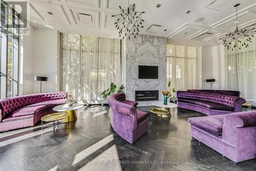 426 - 775 King Street W, Toronto, ON - Indoor Photo Showing Living Room With Fireplace