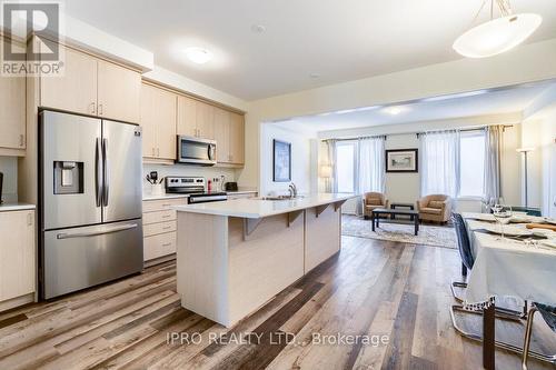 3 - 1285 Sycamore Gardens, Milton, ON - Indoor Photo Showing Kitchen With Stainless Steel Kitchen With Upgraded Kitchen