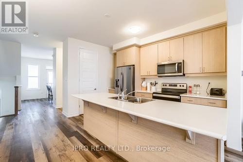 3 - 1285 Sycamore Gardens, Milton, ON - Indoor Photo Showing Kitchen With Double Sink