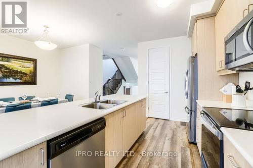 3 - 1285 Sycamore Gardens, Milton, ON - Indoor Photo Showing Kitchen With Stainless Steel Kitchen With Double Sink