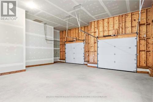 5777 Highway 38, South Frontenac (Frontenac South), ON - Indoor Photo Showing Garage