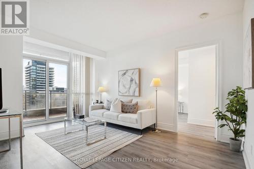 1406 - 123 Eglinton Avenue E, Toronto, ON - Indoor Photo Showing Living Room